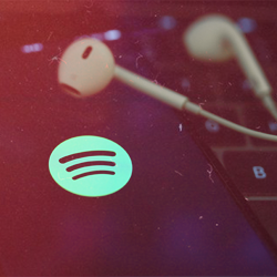 Image of earphones and the spotify logo